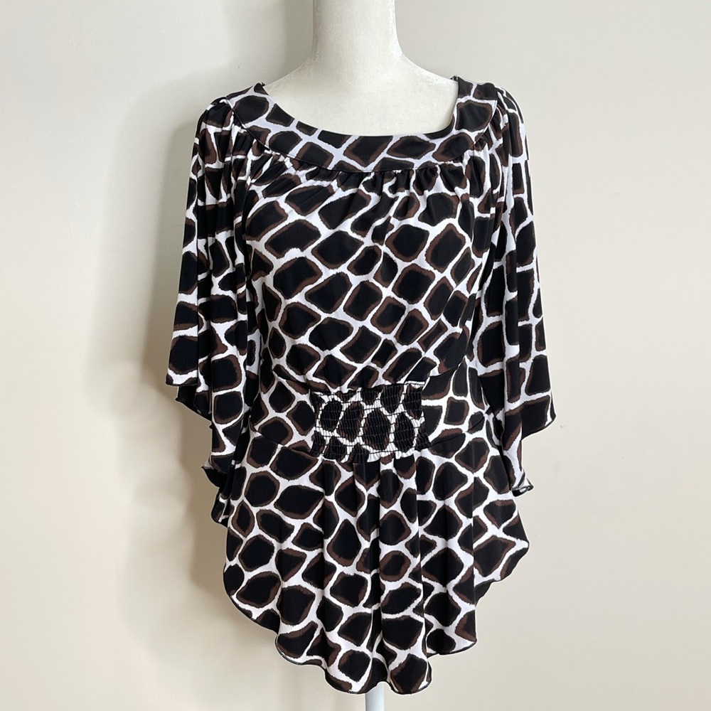 White House Black Market Giraffe Print Blouse.